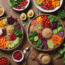 Vibrant plant-based meal featuring fresh vegetables, quinoa, and leafy greens on a wooden table.